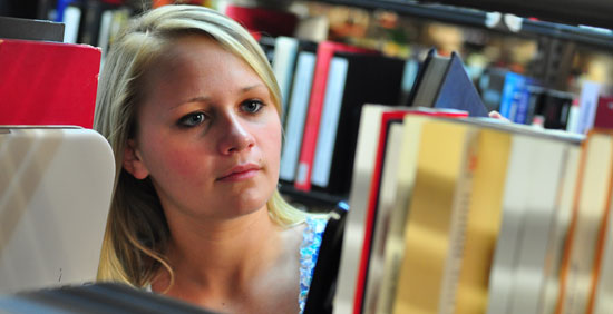 Image of a student searching for a book