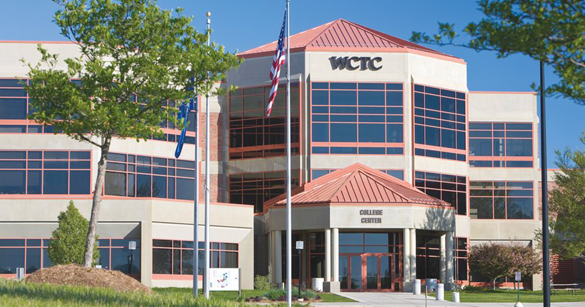 Wide shot photo of WCTC main building outside in sun