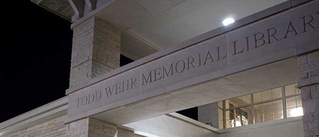 Todd Wehr Memorial Library exterior at night