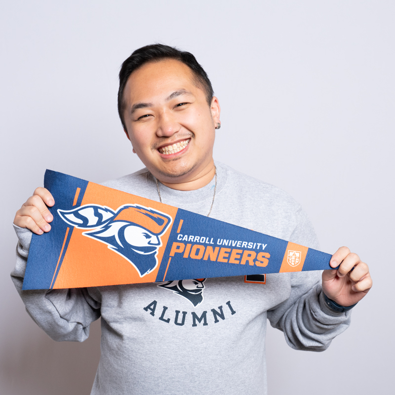 Man in Carroll Alumni sweatshirt.