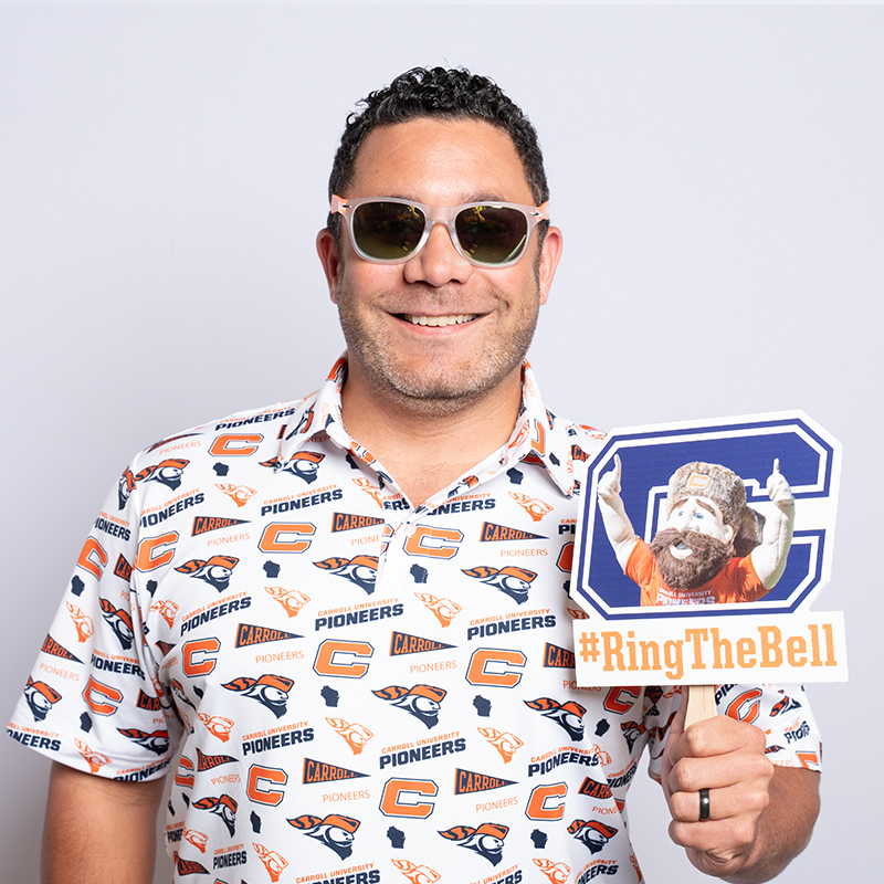 Man in Carroll University Polo.