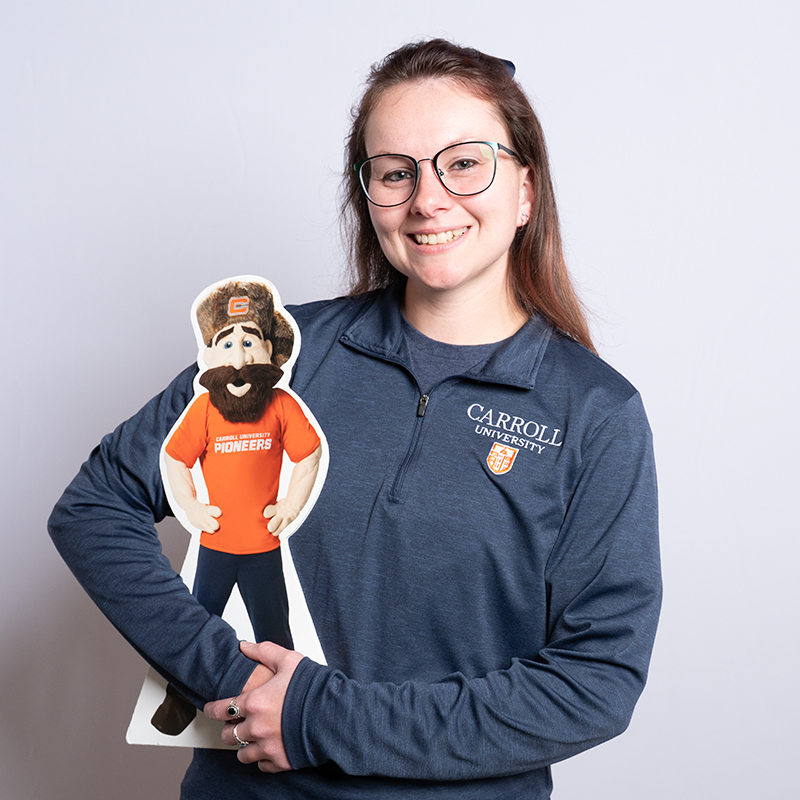 Women in Carroll University quarter zip.