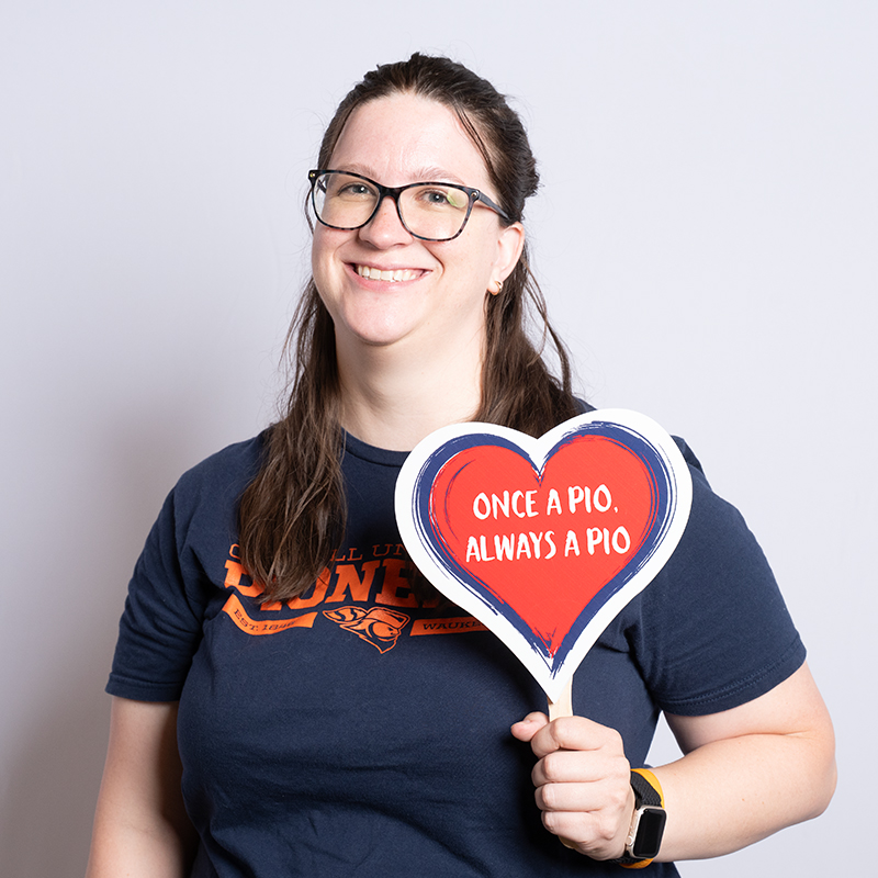 Women in Carroll University shirt.