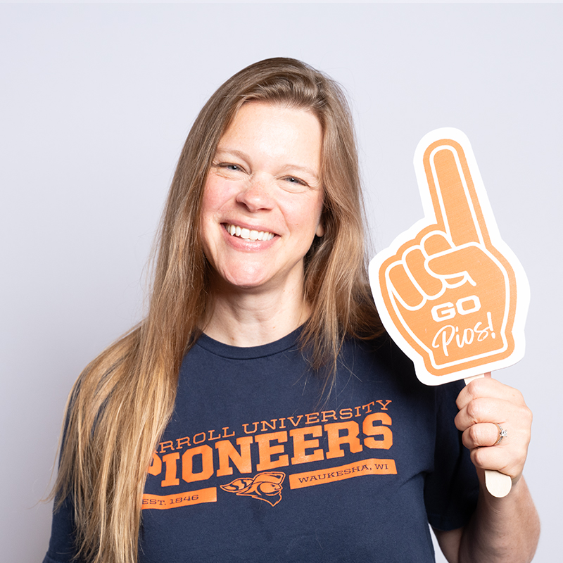 Women in Carroll University shirt.