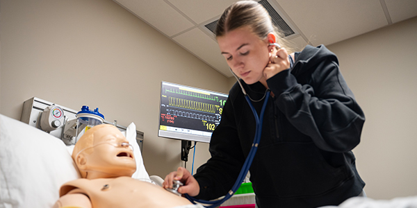 Student working on lab skills.