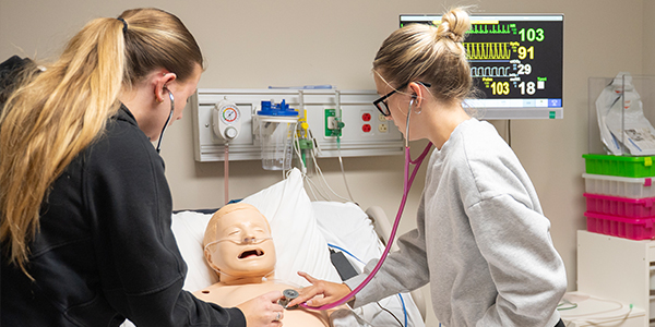 Students working on lab skills.