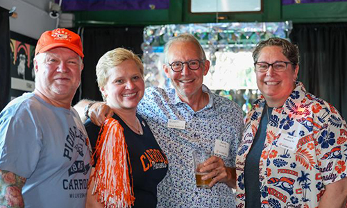 Alumni wearing Carroll spirit wear.