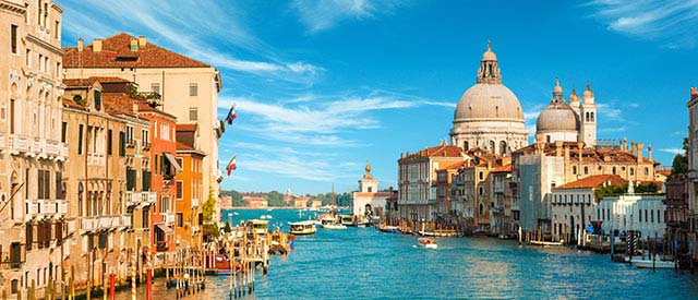 Italian city with blue water and sky