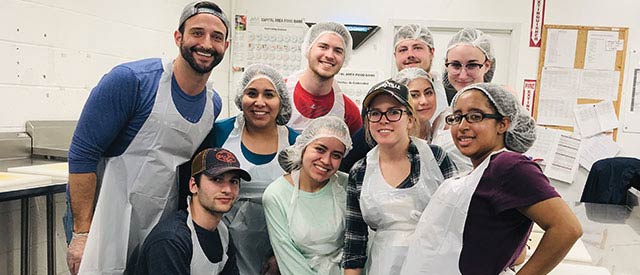 Carrol alumni and students at a food kitchen in Washington, D.C.