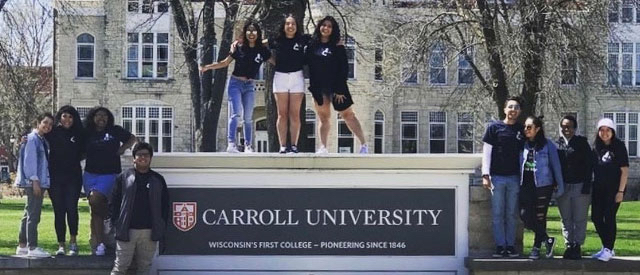 Students at Carroll University sign