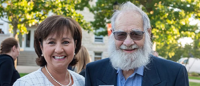 Carroll President Cindy Gnadinger with Alum George Socha