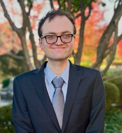 Carroll Alum Anthony Sikorski in suit