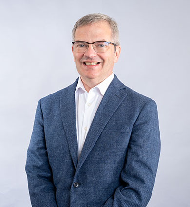 Carroll Provost Dr. Eli Hestermann in suit