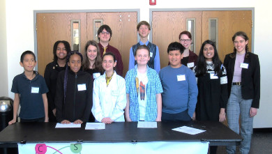 students standing at table