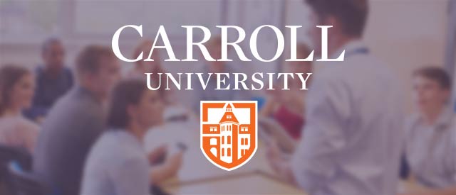 Classroom setting with Carroll University logo