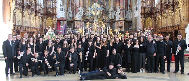 students performing in cathedral