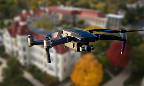 A student flying a drone