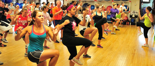 large group of students in a Zumba class