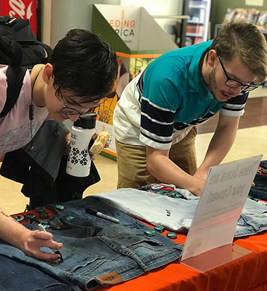 Carroll students at an information booth